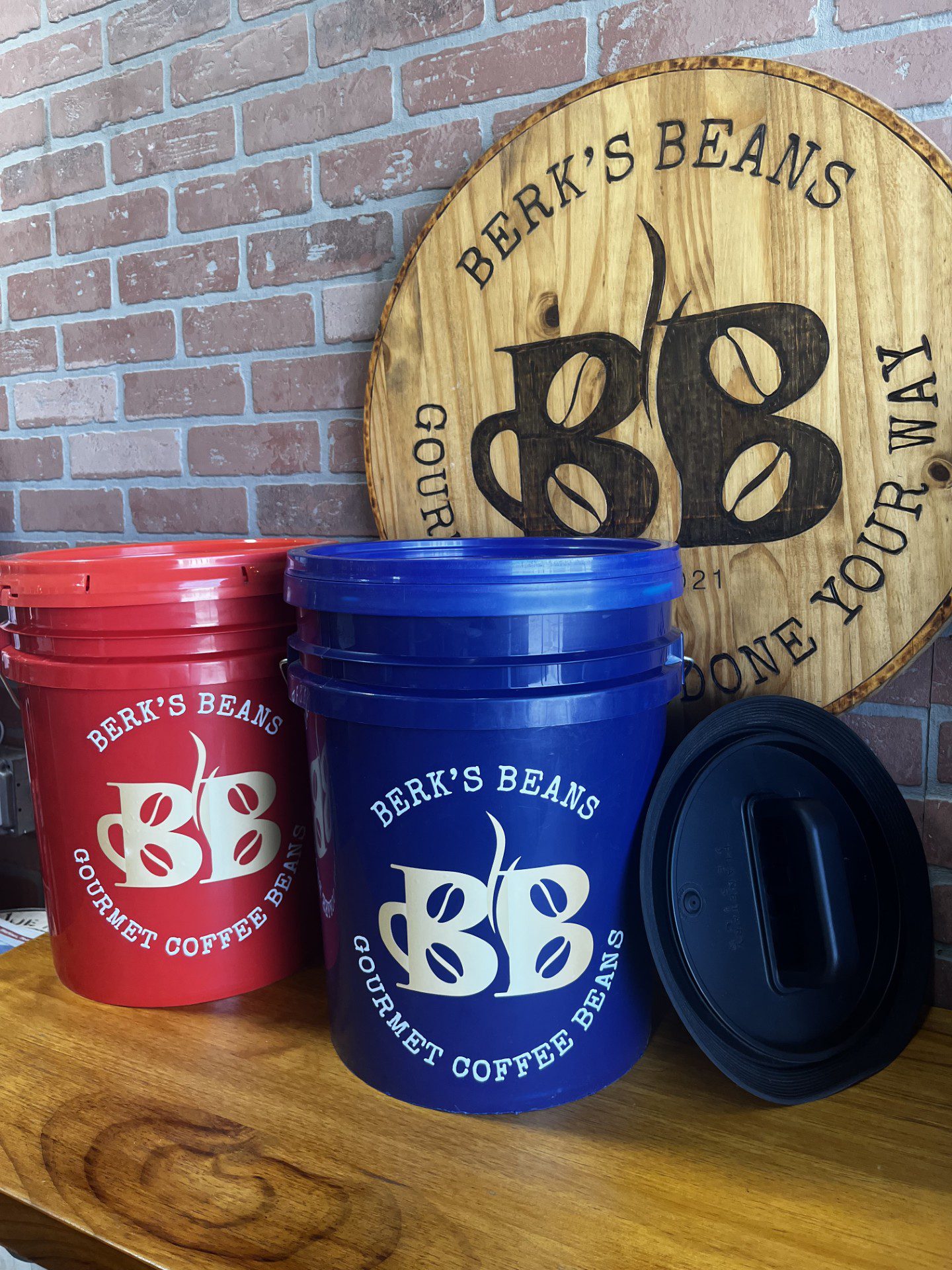 Berk's Beans First Responders Coffee Bucket - red and blue 5-gallon refillable gourmet coffee bean buckets with Airscape lid